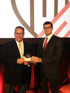 Greg Nett and Albert Covelli holding the award