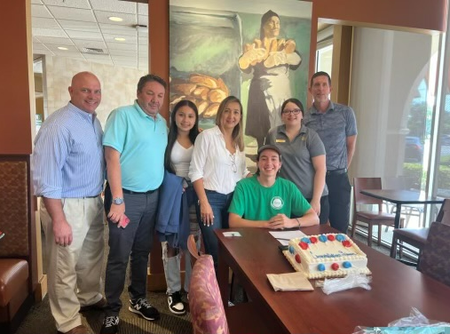 Pictured: Florida Panera Bread team and Simon Ferriera’s family, celebrating Simon receiving the Panera Bread Dream Project Scholarship.